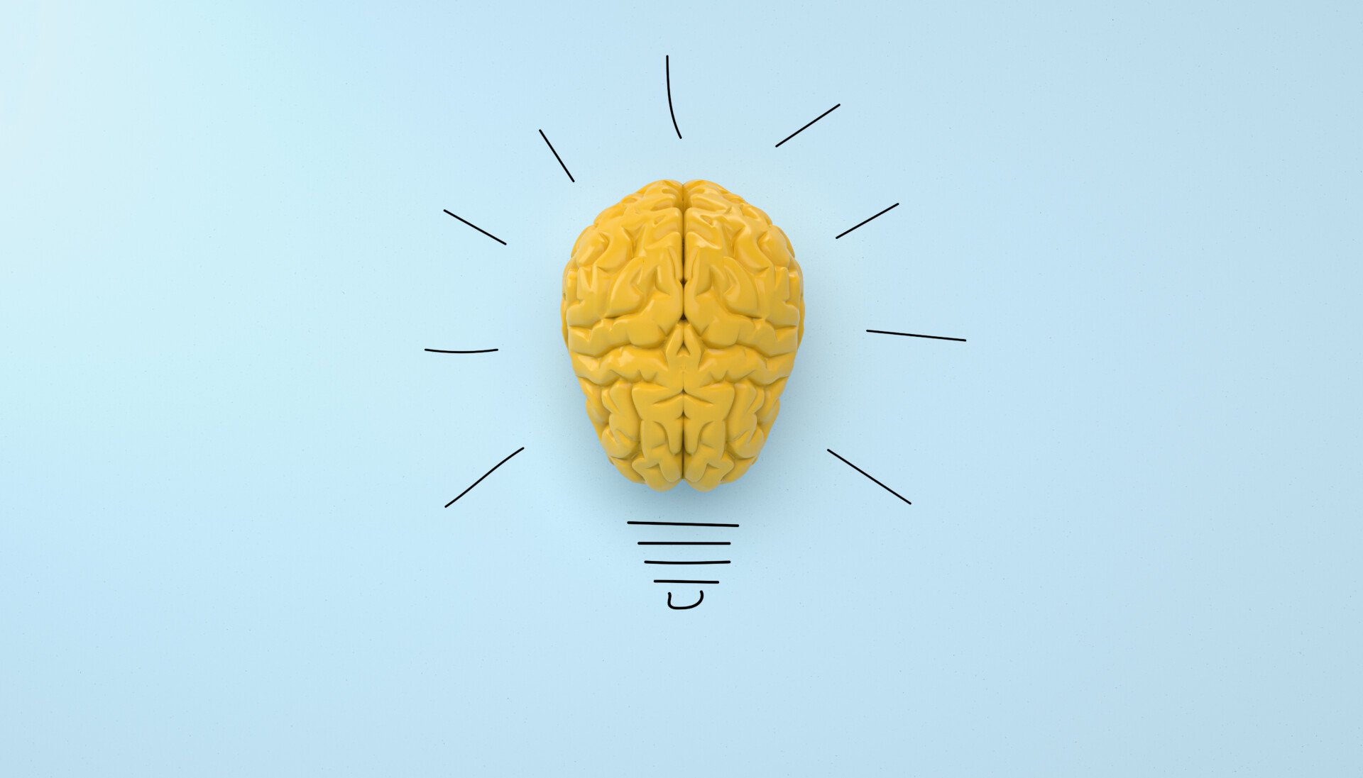 yellow brain on blue clear background, concept light bulb idea with pencil drawing