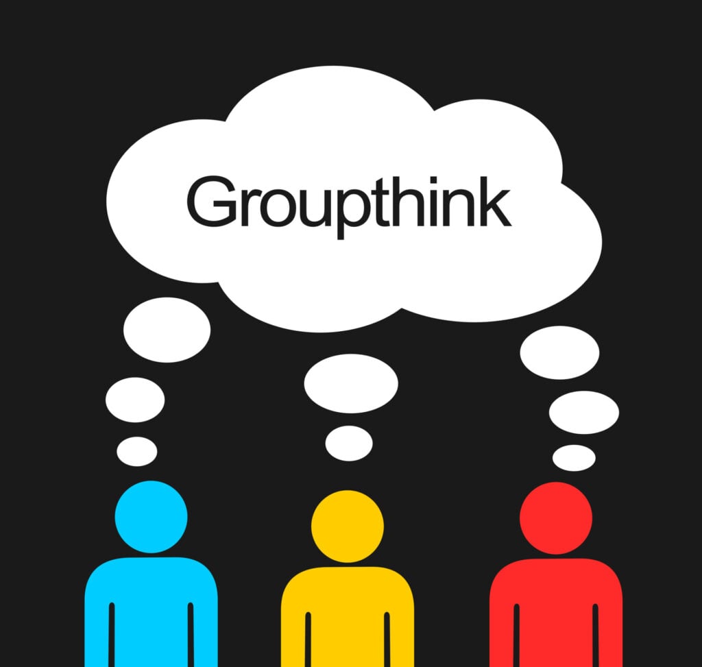 3 stick figures all having the same thought - shared thought bubble with 'groupthink' inside it.